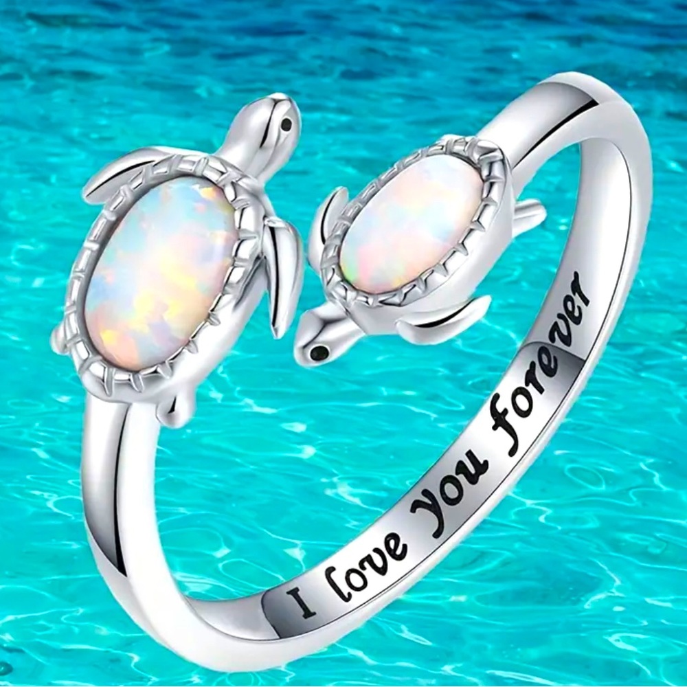 Silver plated adjustable ring with lab created opals on twin turtles 
NWT